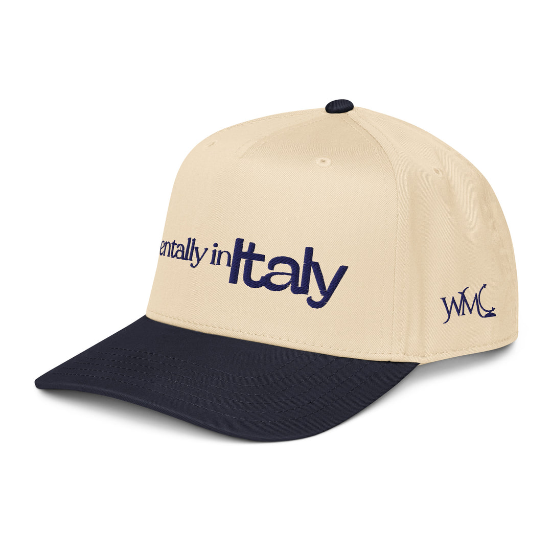 Five panel beige and navy Otto cap with the words Mentally in Italy embroidered with navy colored font on the front of the cap.