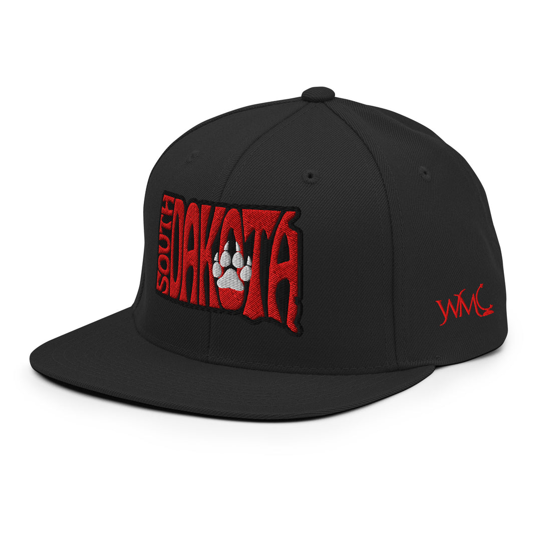 Black snapback cap with the words South Dakota embroidered in red font on the front. A coyote claw sits on the O in Dakota representing the mascot of the University of South Dakota.