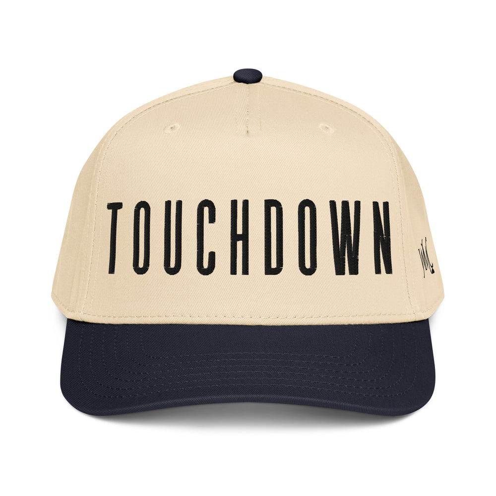 The football term “touchdown” comes from the early days of rugby-style play in the 19th century, when a player had to literally touch the ball down on the ground in the opponent’s end zone to score. American football adopted the phrase in the late 1800s, but unlike rugby, the rules eventually changed so the ball only needed to cross the goal line.