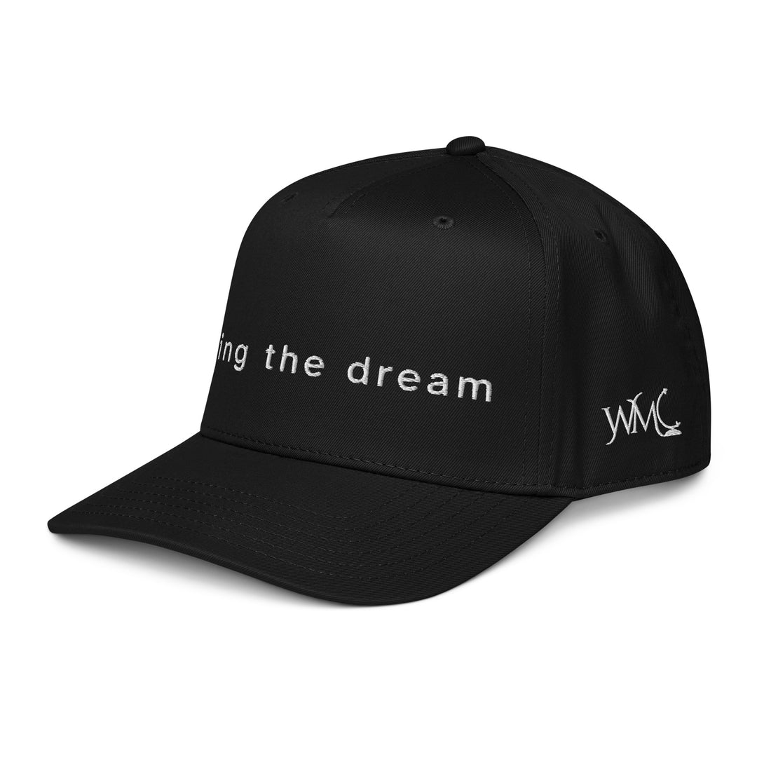 Black five panel Otto cap with the words living the dream embroidered in white font on the front of the cap.