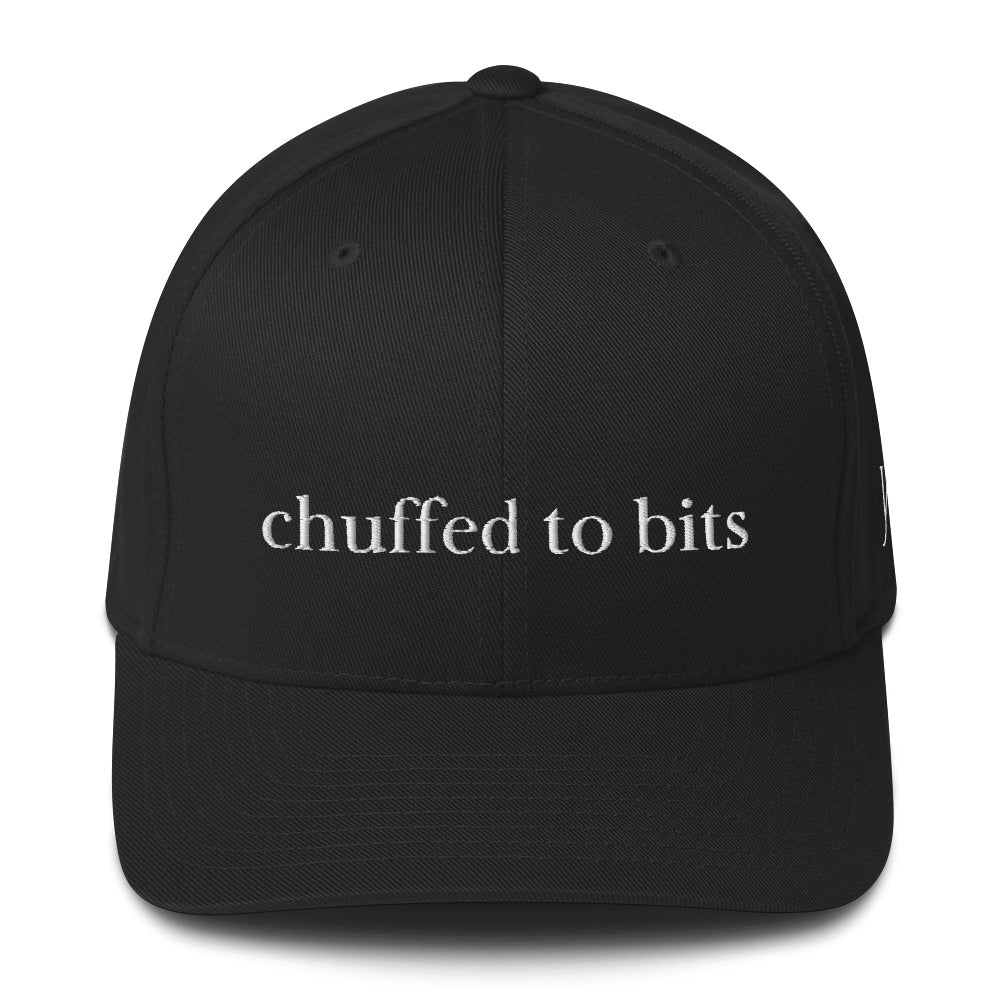 The phrase “chuffed to bits” is a classic piece of British slang that means being extremely pleased or delighted.