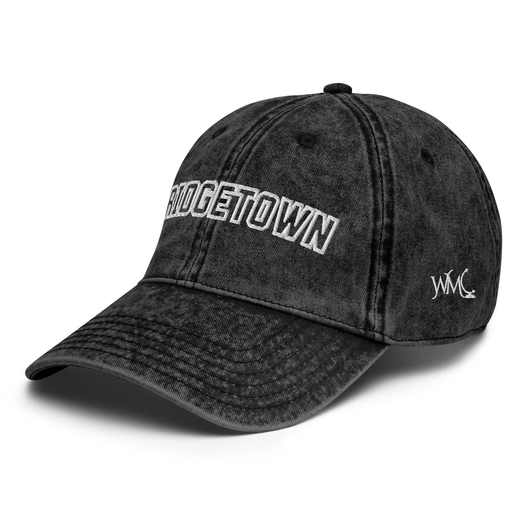 Dark gray vintage-style Barbados cap, featuring the capital’s name, BRIDGETOWN, boldly embroidered across the front is a perfect travel accessory for your next trip to Barbados. 