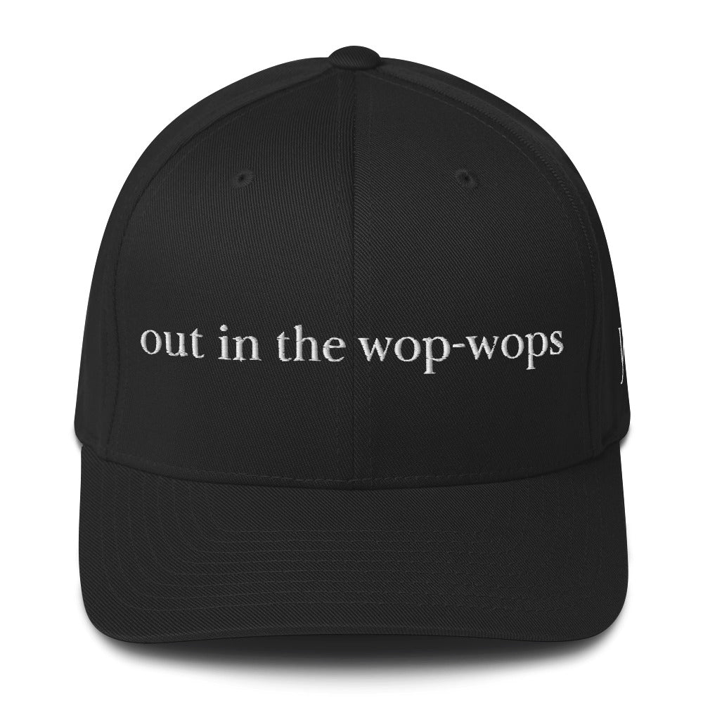 The phrase “out in the wop-wops” originates from New Zealand slang and is used to describe a place that’s very remote or far from civilization. Believed to have emerged in the early 20th century, it reflects rural life in New Zealand, where distant farms and bushland felt isolated from towns.
