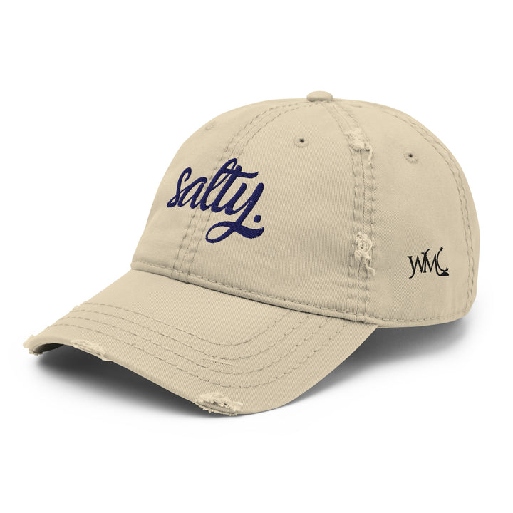 Beige cap with the word Salty embroidered in the front in cursive navy font.