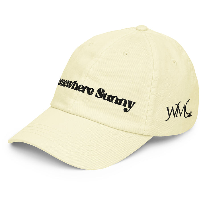 If your ideal destination includes blue skies, warm breezes, and a beach chair with your name on it, the Somewhere Sunny cap is made for you. With Somewhere Sunny embroidered across the front in black font, this pastel lemon colored cap captures the feeling of always chasing your next warm-weather escape.