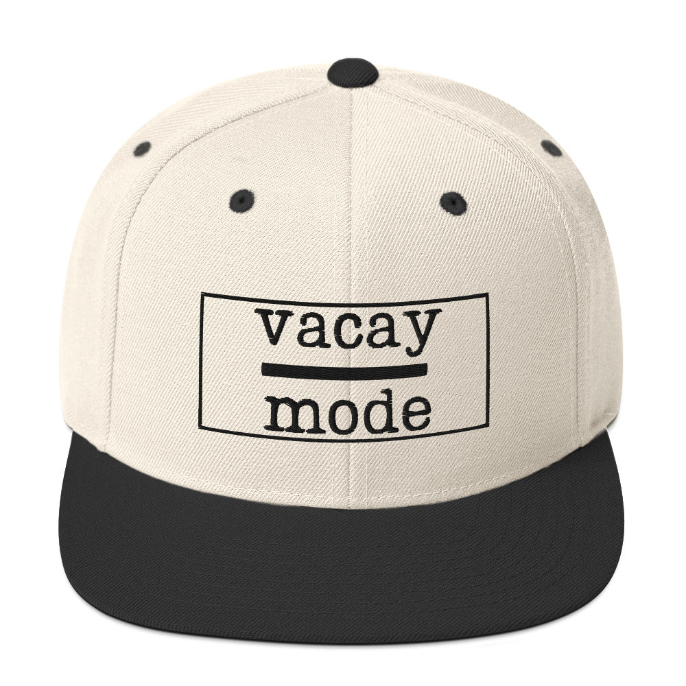 Everyone needs a vacation every now and then. Take this cap on your travels. On the front, “Vacay Mode” is embroidered in bold black lettering, with “Vacay” stacked above “Mode” and separated by a horizontal black line, giving the design a modern, minimalist travel vibe.
