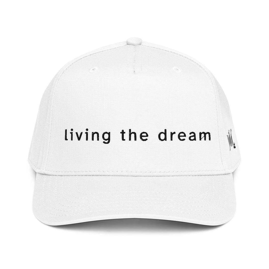 White five panel Otto cap with the words living the dream embroidered in black on the front of the cap in black colored font.
