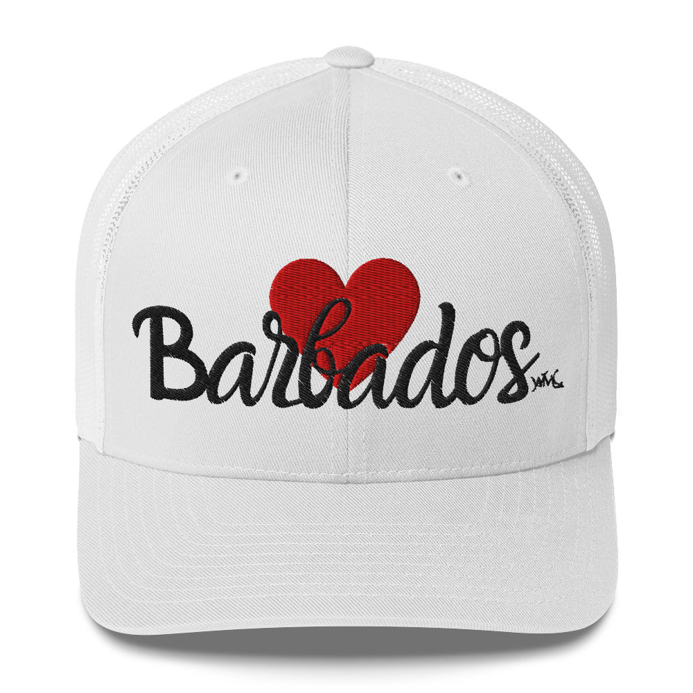 White trucker cap with the word Barbados in black font against the backdrop of a large red heart.